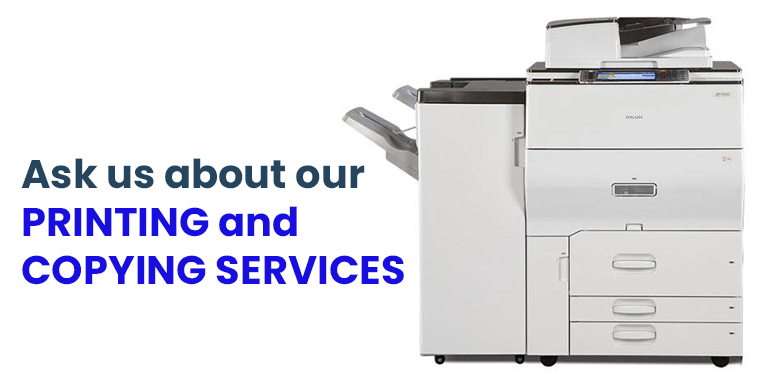 An upright photo copier stands against a white backdrop advertising copy and print services